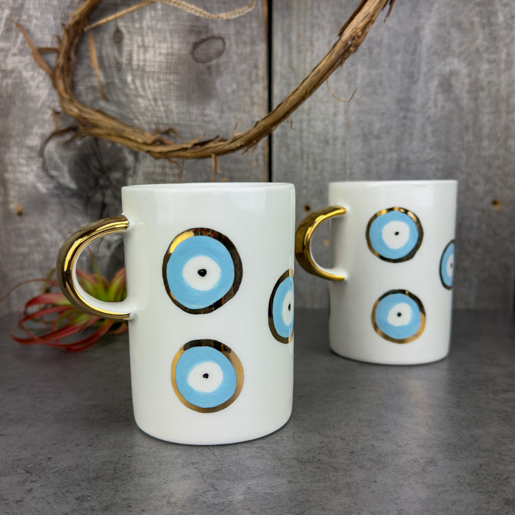 Zeep Naturals | White Ceramic Evil Eye Coffee/Tea Cups | Zeep Naturals brings you handcrafted soaps, organic cotton towels, and artisan kitchen essentials — all inspired by nature. Discover simple, sustainable living with products designed to soothe your senses and your home.