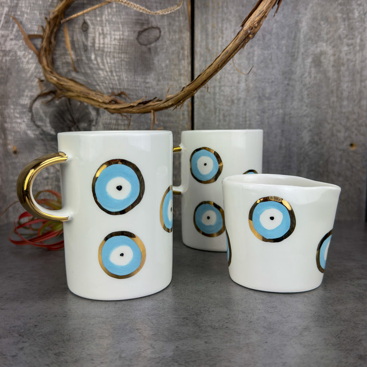 Zeep Naturals | White Ceramic Evil Eye Coffee/Tea Cups | Zeep Naturals brings you handcrafted soaps, organic cotton towels, and artisan kitchen essentials — all inspired by nature. Discover simple, sustainable living with products designed to soothe your senses and your home.