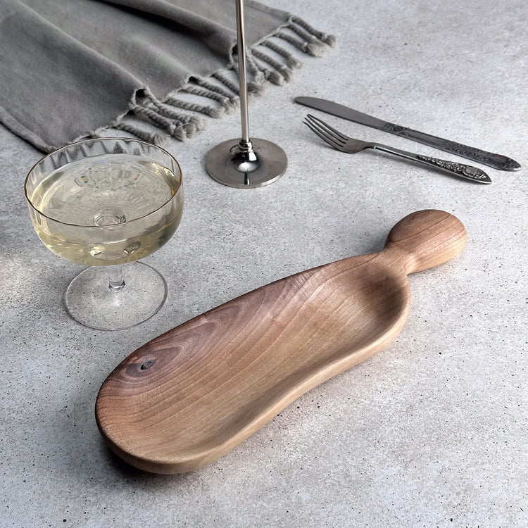 Zeep Naturals | Carya Collection Walnut Curved Serving & Presentation Board | Zeep Naturals brings you handcrafted soaps, organic cotton towels, and artisan kitchen essentials — all inspired by nature. Discover simple, sustainable living with products designed to soothe your senses and your home.