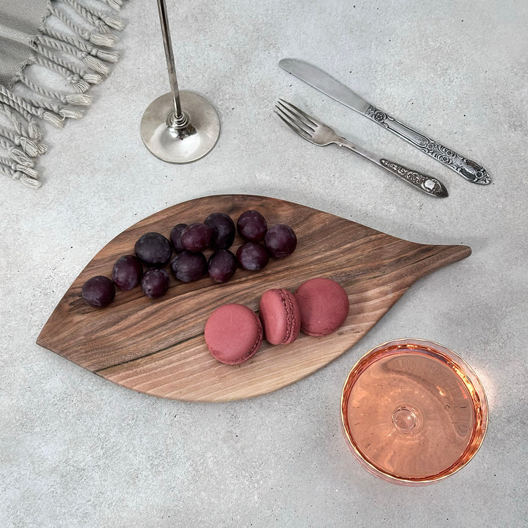 Zeep Naturals | Carya Collection Leaf-Shaped Walnut Curved Serving & Presentation Board | Zeep Naturals brings you handcrafted soaps, organic cotton towels, and artisan kitchen essentials — all inspired by nature. Discover simple, sustainable living with products designed to soothe your senses and your home.