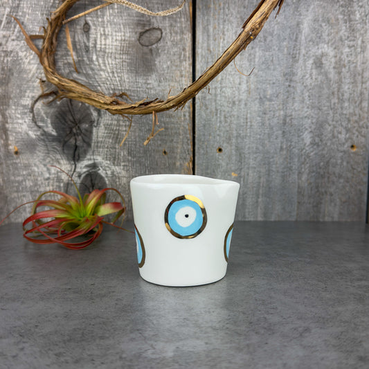 Zeep Naturals | White Ceramic Handmade Milk Dispenser | Evil Eye Evil Eye | Zeep Naturals brings you handcrafted soaps, organic cotton towels, and artisan kitchen essentials — all inspired by nature. Discover simple, sustainable living with products designed to soothe your senses and your home.