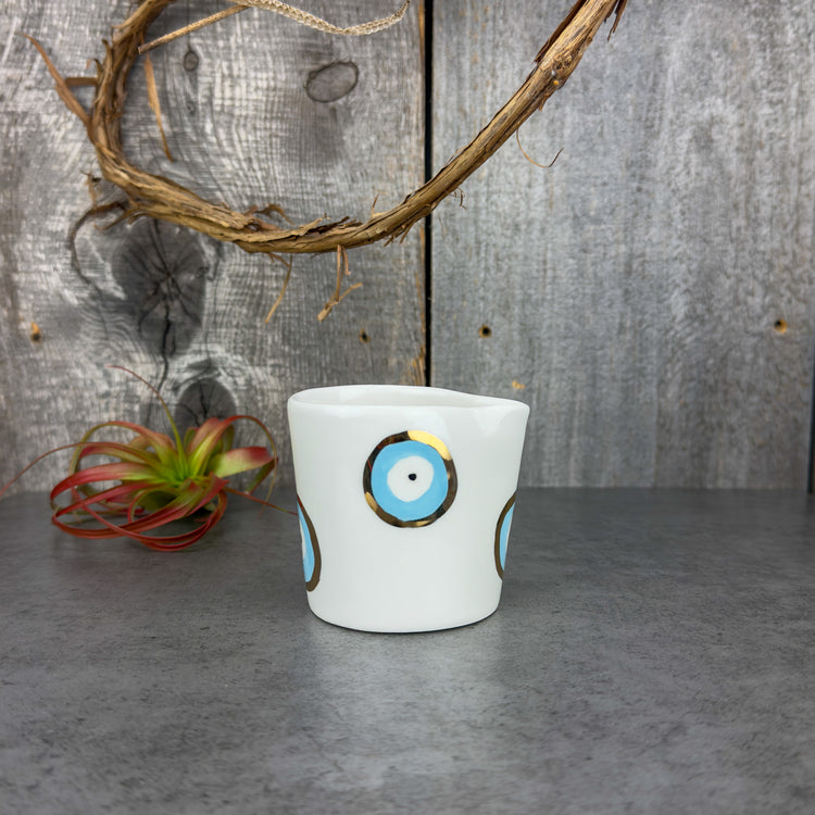 Zeep Naturals | White Ceramic Handmade Milk Dispenser | Evil Eye Evil Eye | Zeep Naturals brings you handcrafted soaps, organic cotton towels, and artisan kitchen essentials — all inspired by nature. Discover simple, sustainable living with products designed to soothe your senses and your home.