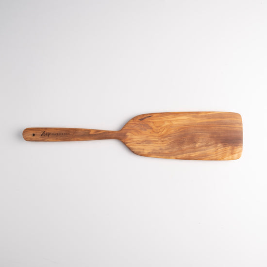 Zeep Naturals | Olive Wood Large Spatula | Zeep Naturals brings you handcrafted soaps, organic cotton towels, and artisan kitchen essentials — all inspired by nature. Discover simple, sustainable living with products designed to soothe your senses and your home.
