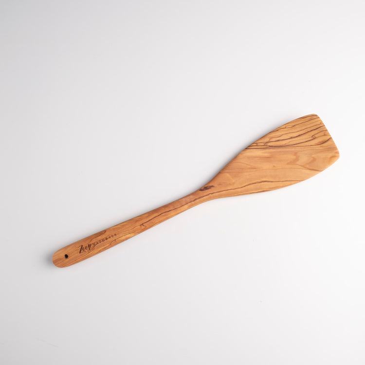 Zeep Naturals | Olive Wood Curve Spatula | Zeep Naturals brings you handcrafted soaps, organic cotton towels, and artisan kitchen essentials — all inspired by nature. Discover simple, sustainable living with products designed to soothe your senses and your home.