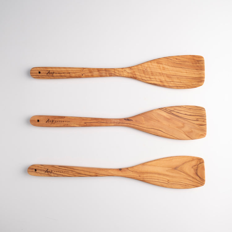 Zeep Naturals | Olive Wood Curve Spatula | Zeep Naturals brings you handcrafted soaps, organic cotton towels, and artisan kitchen essentials — all inspired by nature. Discover simple, sustainable living with products designed to soothe your senses and your home.