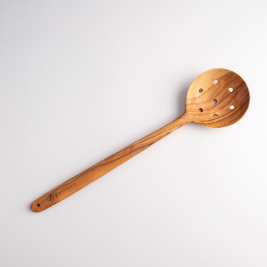 Zeep Naturals | Olive Wood Slotted Round Spoon | Zeep Naturals brings you handcrafted soaps, organic cotton towels, and artisan kitchen essentials — all inspired by nature. Discover simple, sustainable living with products designed to soothe your senses and your home.
