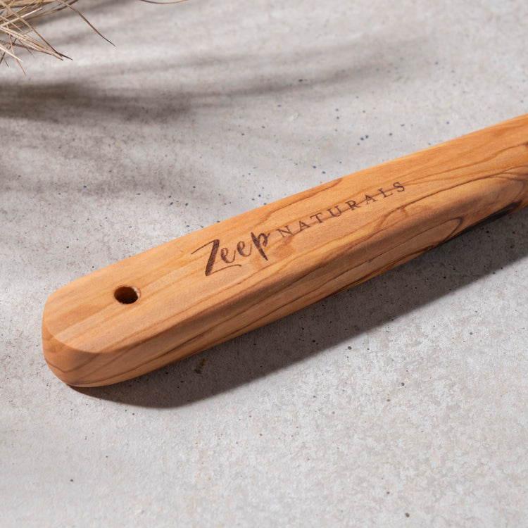Zeep Naturals | Olive Wood Curve Spatula | Zeep Naturals brings you handcrafted soaps, organic cotton towels, and artisan kitchen essentials — all inspired by nature. Discover simple, sustainable living with products designed to soothe your senses and your home.