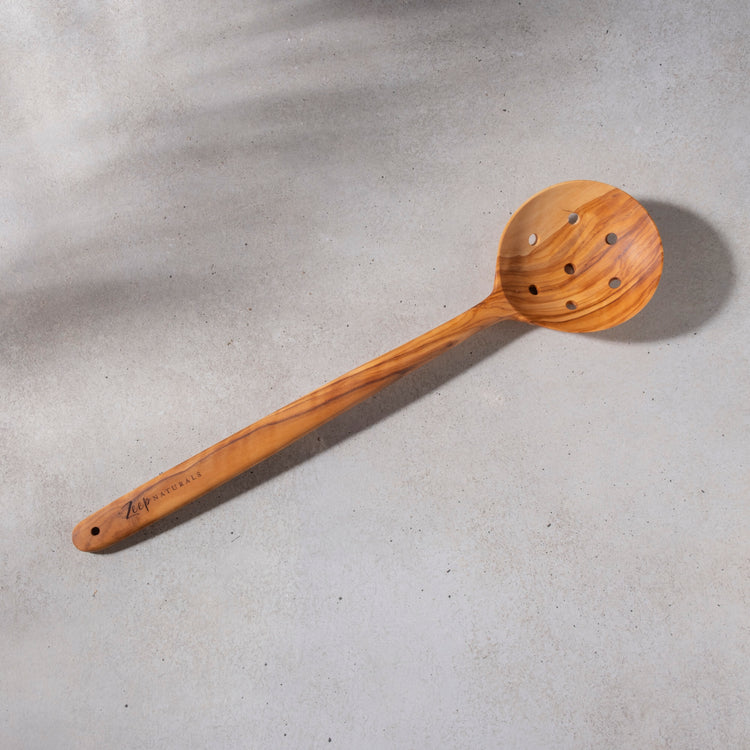 Zeep Naturals | Olive Wood Slotted Round Spoon | Zeep Naturals brings you handcrafted soaps, organic cotton towels, and artisan kitchen essentials — all inspired by nature. Discover simple, sustainable living with products designed to soothe your senses and your home.
