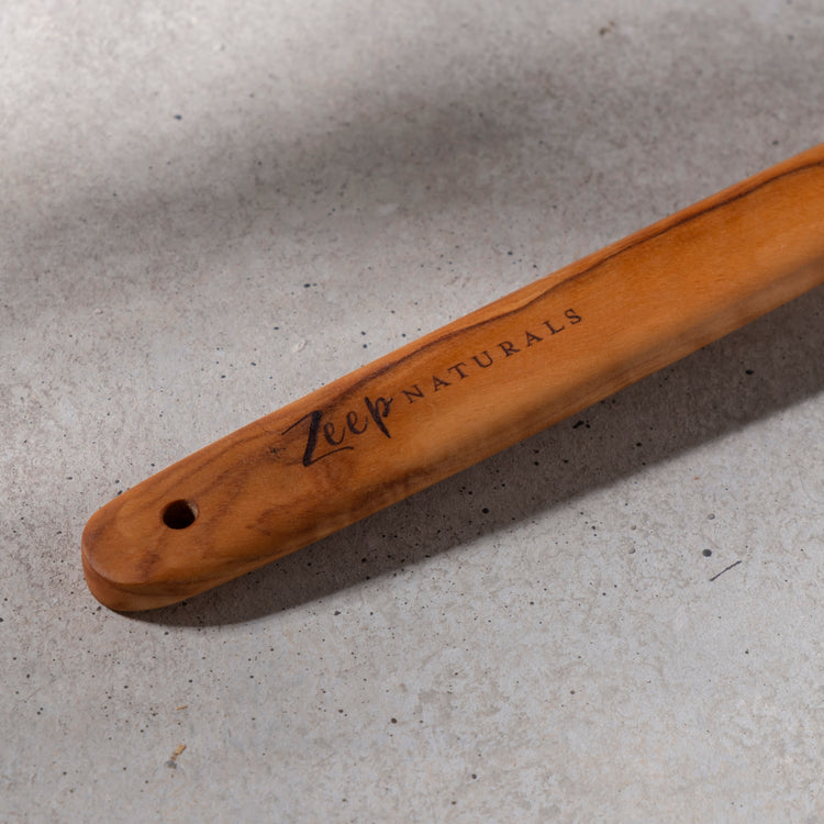 Zeep Naturals | Olive Wood Slotted Round Spoon | Zeep Naturals brings you handcrafted soaps, organic cotton towels, and artisan kitchen essentials — all inspired by nature. Discover simple, sustainable living with products designed to soothe your senses and your home.