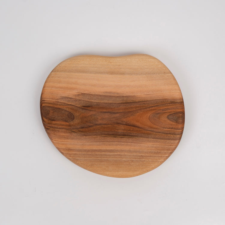 Zeep Naturals | Carya Collection Amorphous Walnut Curved Serving & Presentation Board | Zeep Naturals brings you handcrafted soaps, organic cotton towels, and artisan kitchen essentials — all inspired by nature. Discover simple, sustainable living with products designed to soothe your senses and your home.
