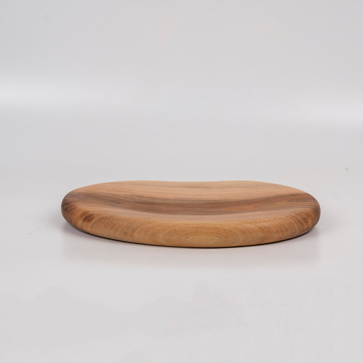 Zeep Naturals | Carya Collection Amorphous Walnut Curved Serving & Presentation Board | Zeep Naturals brings you handcrafted soaps, organic cotton towels, and artisan kitchen essentials — all inspired by nature. Discover simple, sustainable living with products designed to soothe your senses and your home.
