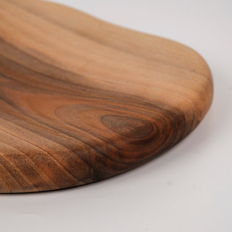 Zeep Naturals | Carya Collection Amorphous Walnut Curved Serving & Presentation Board | Zeep Naturals brings you handcrafted soaps, organic cotton towels, and artisan kitchen essentials — all inspired by nature. Discover simple, sustainable living with products designed to soothe your senses and your home.