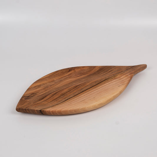 Zeep Naturals | Carya Collection Leaf-Shaped Walnut Curved Serving & Presentation Board | Zeep Naturals brings you handcrafted soaps, organic cotton towels, and artisan kitchen essentials — all inspired by nature. Discover simple, sustainable living with products designed to soothe your senses and your home.