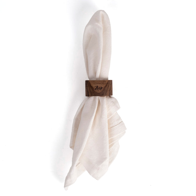 Zeep Naturals | Carya Collection Walnut Napkin Ring Set (4 Pieces) | Zeep Naturals brings you handcrafted soaps, organic cotton towels, and artisan kitchen essentials — all inspired by nature. Discover simple, sustainable living with products designed to soothe your senses and your home.
