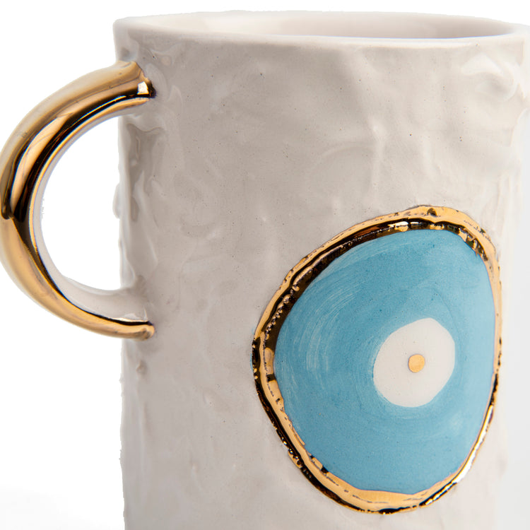 Zeep Naturals | White Ceramic Coffee/Tea Cup | Eternal Eye | Zeep Naturals brings you handcrafted soaps, organic cotton towels, and artisan kitchen essentials — all inspired by nature. Discover simple, sustainable living with products designed to soothe your senses and your home.
