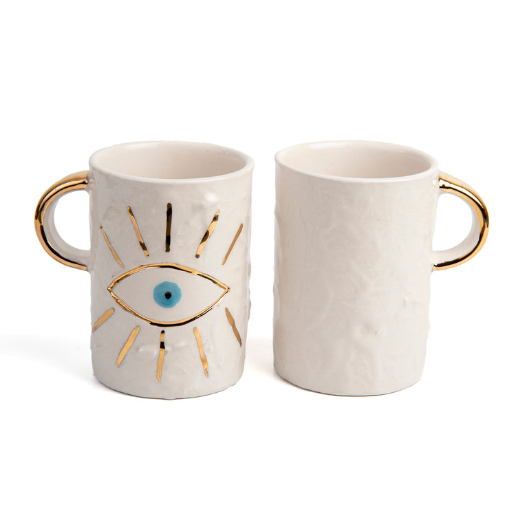 Zeep Naturals | White Ceramic Coffee/Tea Cup | Charming Eye | Zeep Naturals brings you handcrafted soaps, organic cotton towels, and artisan kitchen essentials — all inspired by nature. Discover simple, sustainable living with products designed to soothe your senses and your home.