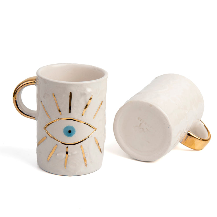 Zeep Naturals | White Ceramic Coffee/Tea Cup | Charming Eye | Zeep Naturals brings you handcrafted soaps, organic cotton towels, and artisan kitchen essentials — all inspired by nature. Discover simple, sustainable living with products designed to soothe your senses and your home.