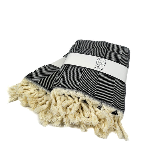 Zeep Naturals | Black Towels Herringbone | Catskills-inspired artisan natural soaps, luxurious Turkish towels, bathrobes, throws, and bedding. Discover handmade coffee cups, milk dispensers, and olive wood kitchen utensils—crafted with care for your home