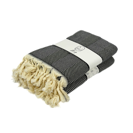 Zeep Naturals | Black Towels Herringbone | Catskills-inspired artisan natural soaps, luxurious Turkish towels, bathrobes, throws, and bedding. Discover handmade coffee cups, milk dispensers, and olive wood kitchen utensils—crafted with care for your home