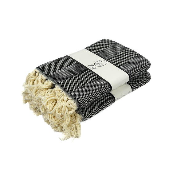 Zeep Naturals | Black Towels Zebra | Catskills-inspired artisan natural soaps, luxurious Turkish towels, bathrobes, throws, and bedding. Discover handmade coffee cups, milk dispensers, and olive wood kitchen utensils—crafted with care for your home