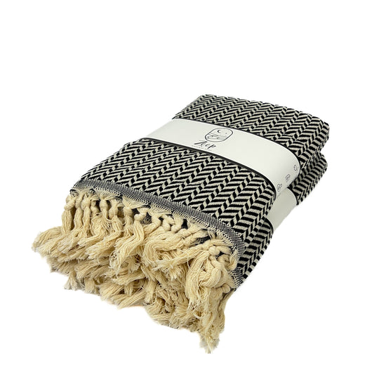 Zeep Naturals | Black Towels Zig-Zag | Catskills-inspired artisan natural soaps, luxurious Turkish towels, bathrobes, throws, and bedding. Discover handmade coffee cups, milk dispensers, and olive wood kitchen utensils—crafted with care for your home