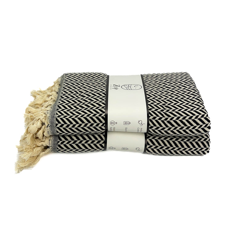 Zeep Naturals | Black Towels Zig-Zag | Catskills-inspired artisan natural soaps, luxurious Turkish towels, bathrobes, throws, and bedding. Discover handmade coffee cups, milk dispensers, and olive wood kitchen utensils—crafted with care for your home