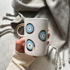 Zeep Naturals | White Ceramic Evil Eye Coffee/Tea Cups | Zeep Naturals brings you handcrafted soaps, organic cotton towels, and artisan kitchen essentials — all inspired by nature. Discover simple, sustainable living with products designed to soothe your senses and your home.
