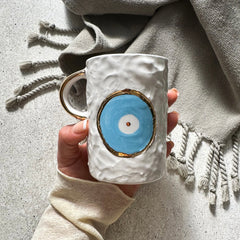 Zeep Naturals | White Ceramic Coffee/Tea Cup | Eternal Eye | Zeep Naturals brings you handcrafted soaps, organic cotton towels, and artisan kitchen essentials — all inspired by nature. Discover simple, sustainable living with products designed to soothe your senses and your home.