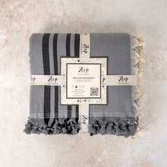 Zeep Naturals | Quiet Loom Vinora Blankets Stone Grey | Zeep Naturals brings you handcrafted soaps, organic cotton towels, and artisan kitchen essentials — all inspired by nature. Discover simple, sustainable living with products designed to soothe your senses and your home.