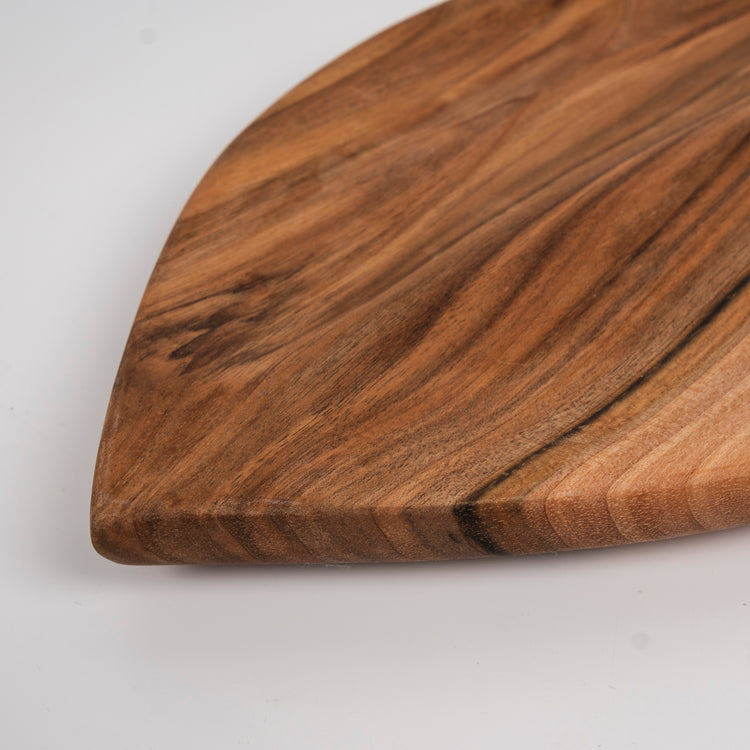 Zeep Naturals | Carya Collection Leaf-Shaped Walnut Curved Serving & Presentation Board | Zeep Naturals brings you handcrafted soaps, organic cotton towels, and artisan kitchen essentials — all inspired by nature. Discover simple, sustainable living with products designed to soothe your senses and your home.