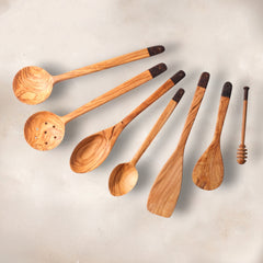 Zeep Naturals | Olive Wood Ember Grain Slotted Round Spoon | Zeep Naturals brings you handcrafted soaps, organic cotton towels, and artisan kitchen essentials — all inspired by nature. Discover simple, sustainable living with products designed to soothe your senses and your home.