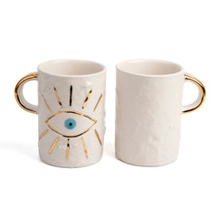 Zeep Naturals | White Ceramic Coffee/Tea Cup | Charming Eye | Zeep Naturals brings you handcrafted soaps, organic cotton towels, and artisan kitchen essentials — all inspired by nature. Discover simple, sustainable living with products designed to soothe your senses and your home.