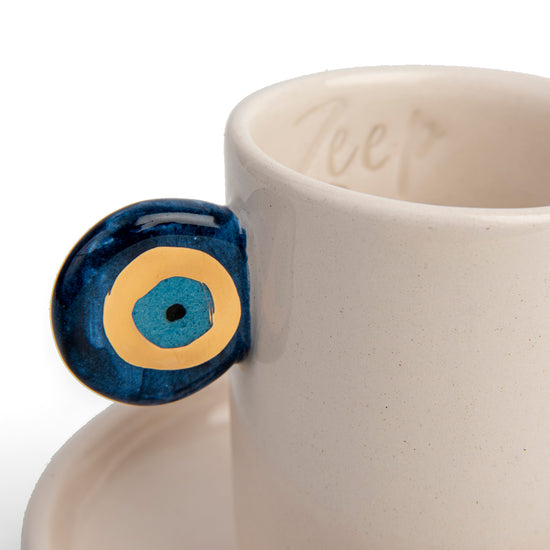 Zeep Naturals | Ceramic Handmade 2-Piece Slim Espresso Cups Evil Eye Handle | Catskills-inspired artisan natural soaps, luxurious Turkish towels, bathrobes, throws, and bedding. Discover handmade coffee cups, milk dispensers, and olive wood kitchen utensils—crafted with care for your home